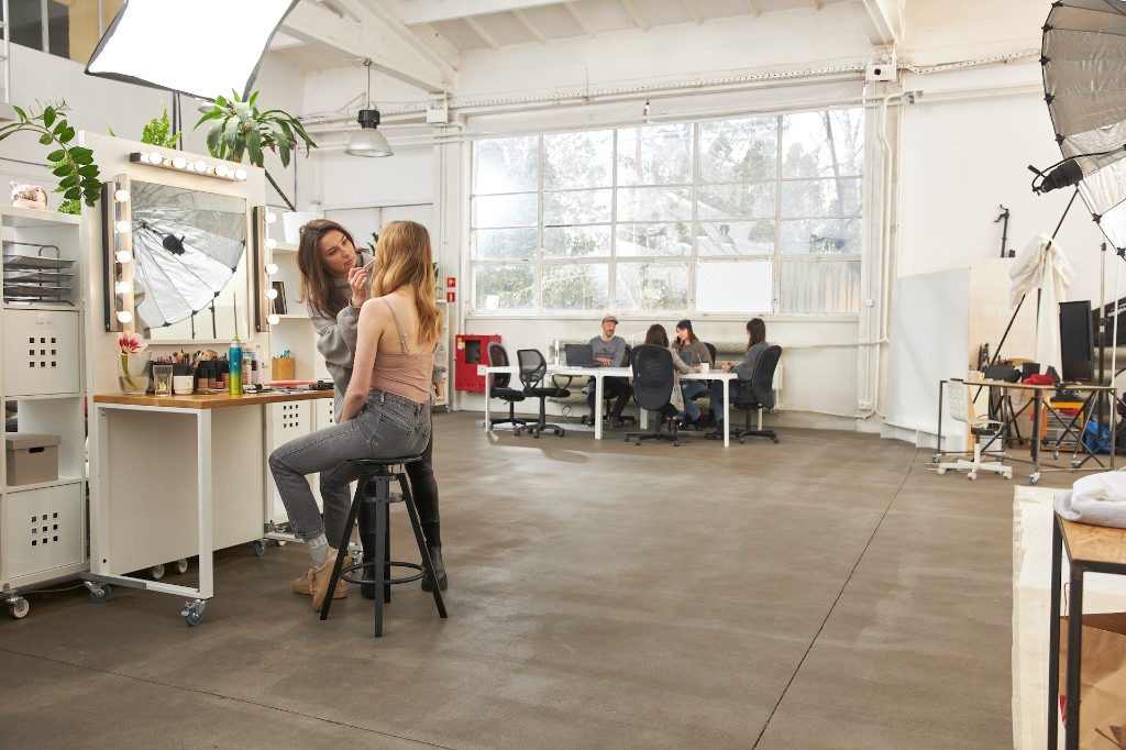 The make-up station at EVG Studio, with the team work area in the background